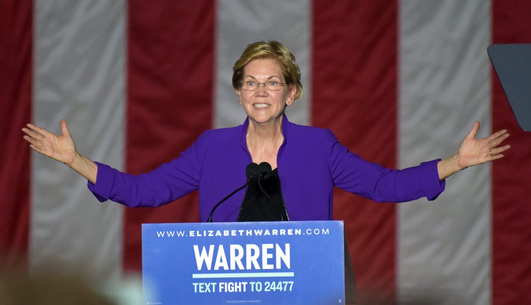 Elizabeth Warren Embraces LGBTQ Supporter at Iowa Rally
